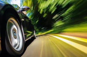 Car speeding down a road